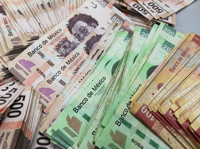 Mexican money. marijuana legal in mexico